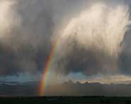 Greg Geffner Photo. Rainbow Over The Tetons With Cloud.